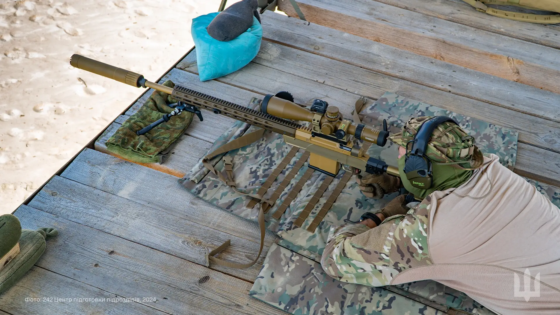 Ukrainian soldier with a HLR 338 precision rifle