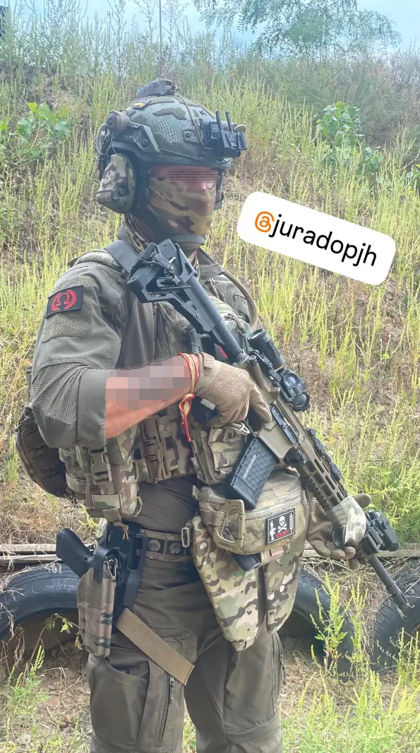 Soldier with an MK 556 assault rifle