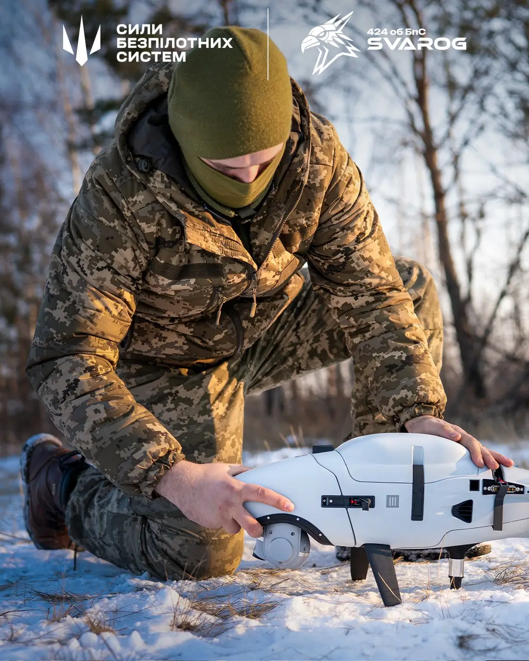 Ukrainian soldier works on a Vector UAV during winter