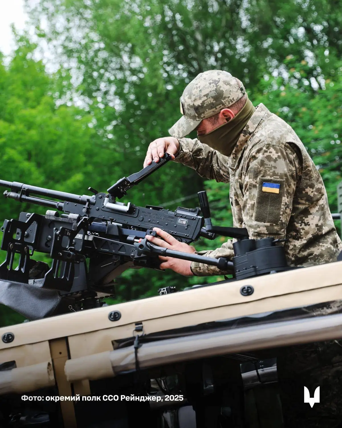 Ukrainian SOF on top of a Caracal air assault vehicle