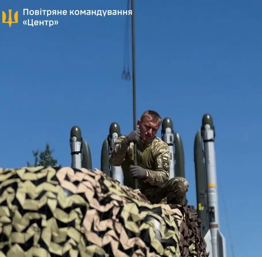 Ukrainian soldier is working on an IRIS-T SLS launcher