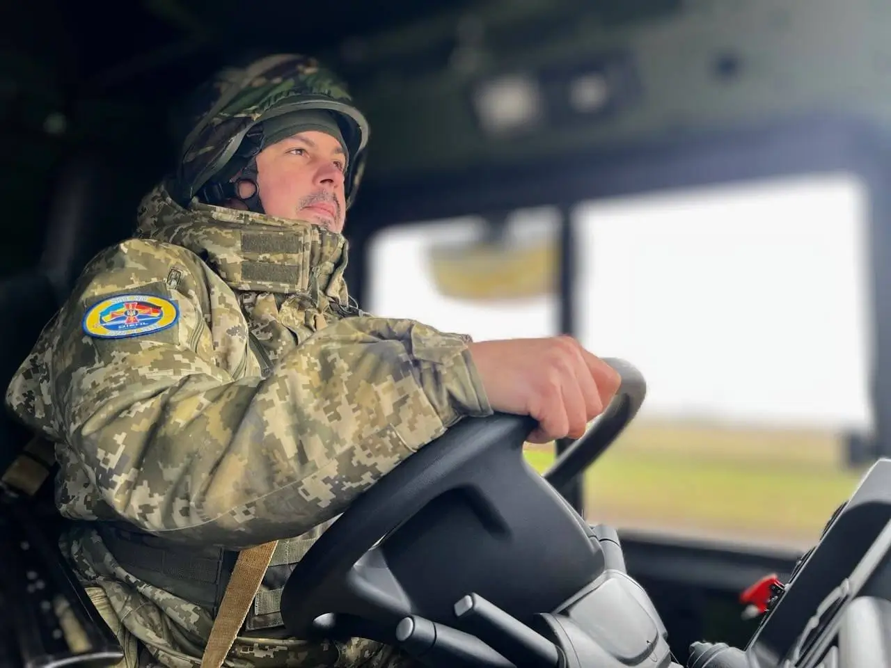 Ukrainian soldier driving an IRIS-T SLM launcher
