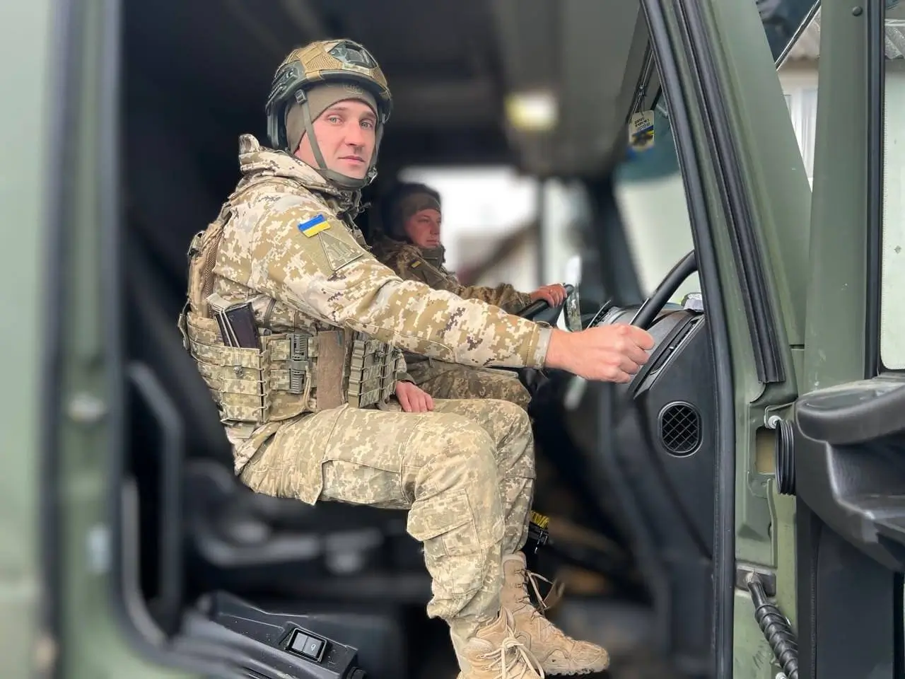 Ukrainian soldiers sitting inside an IRIS-T SLM launcher