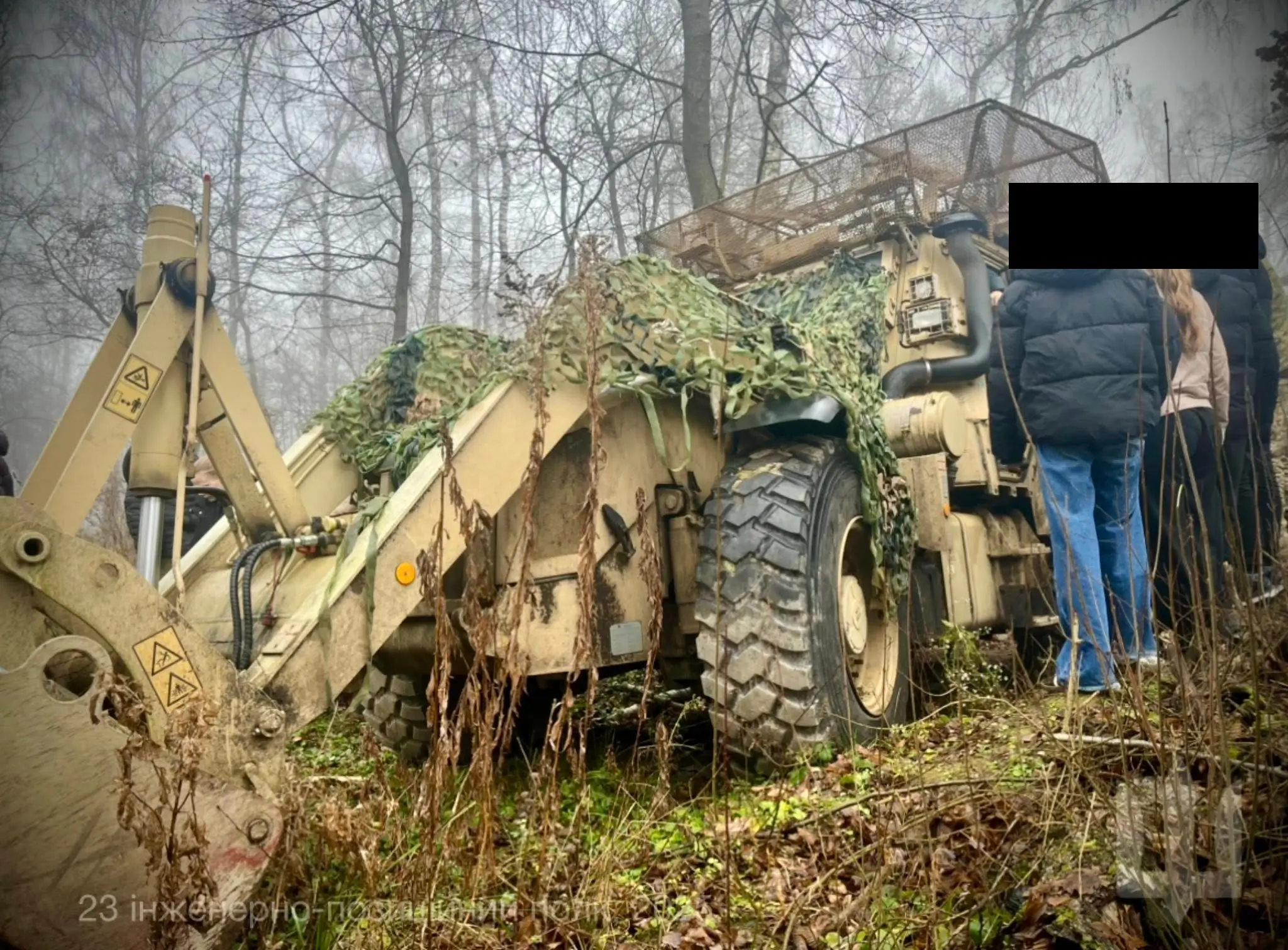 JCB HMEE during a presentation