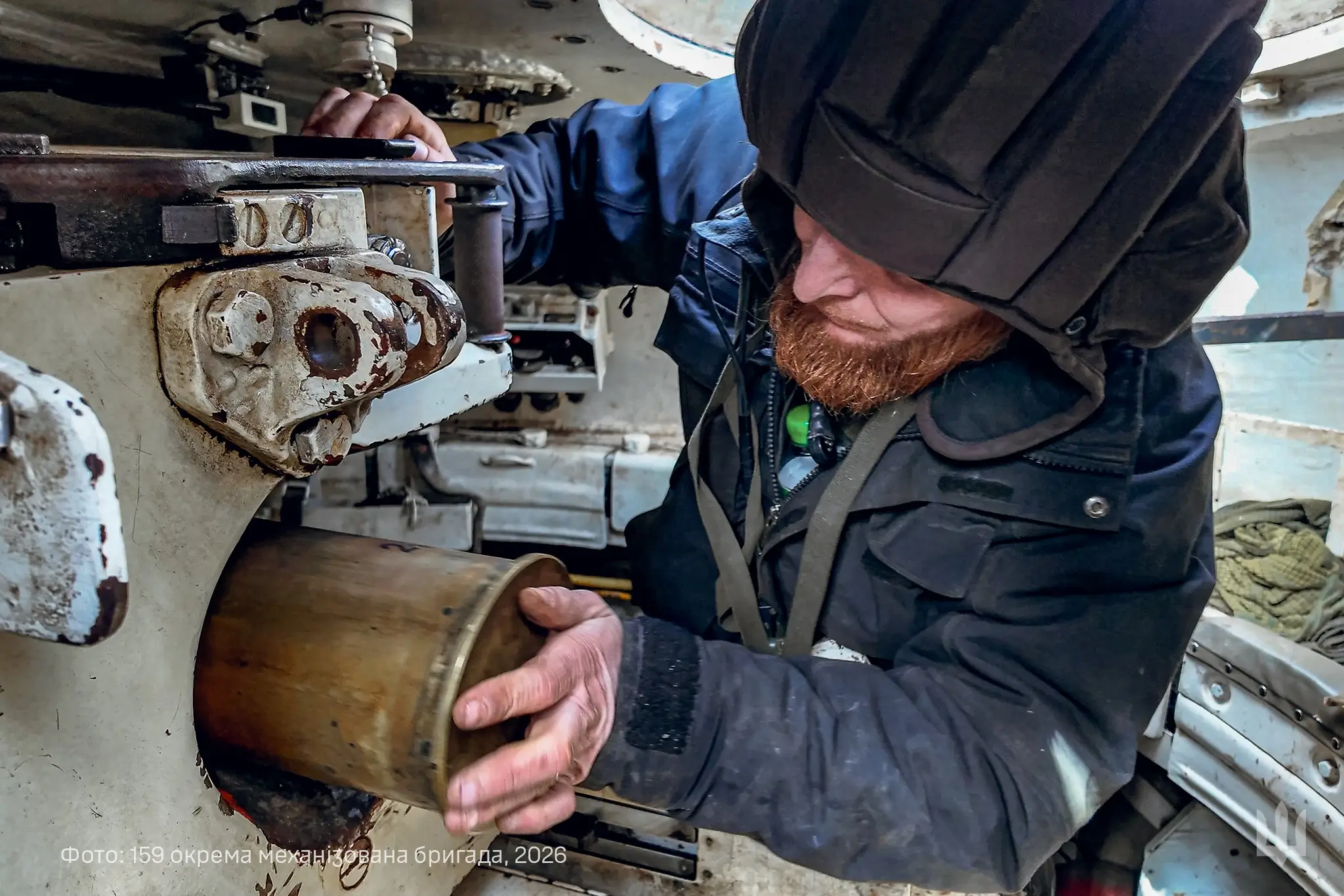 A Ukrainian soldier loads an M-55S