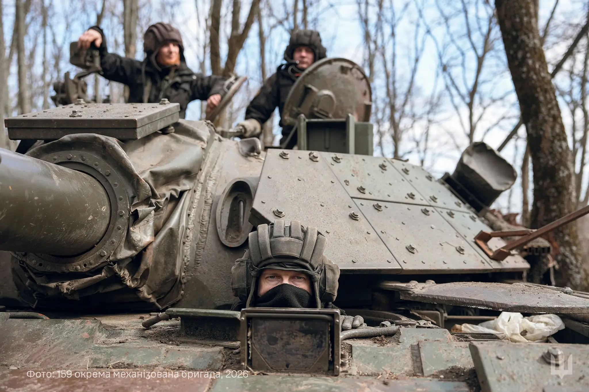 Ukrainian soldiers sitting inside an M-55S