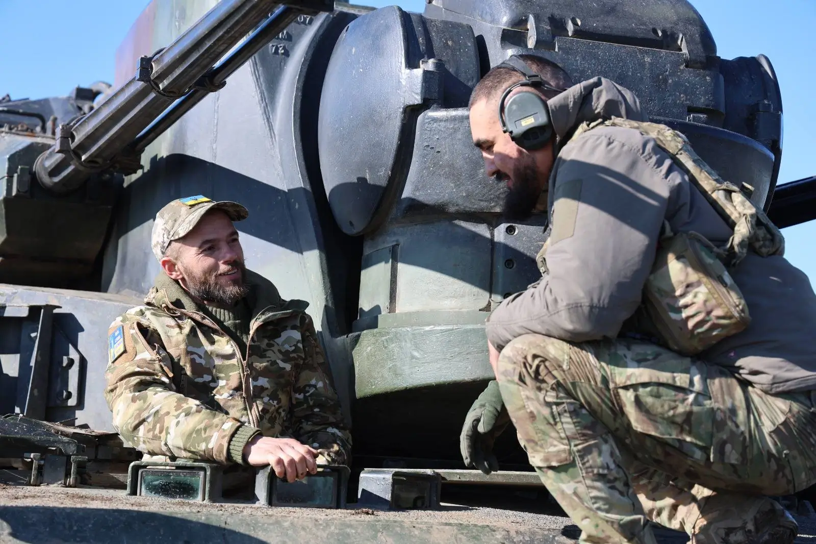 Ukrainian soldiers on top of a Cheetah SPAAG